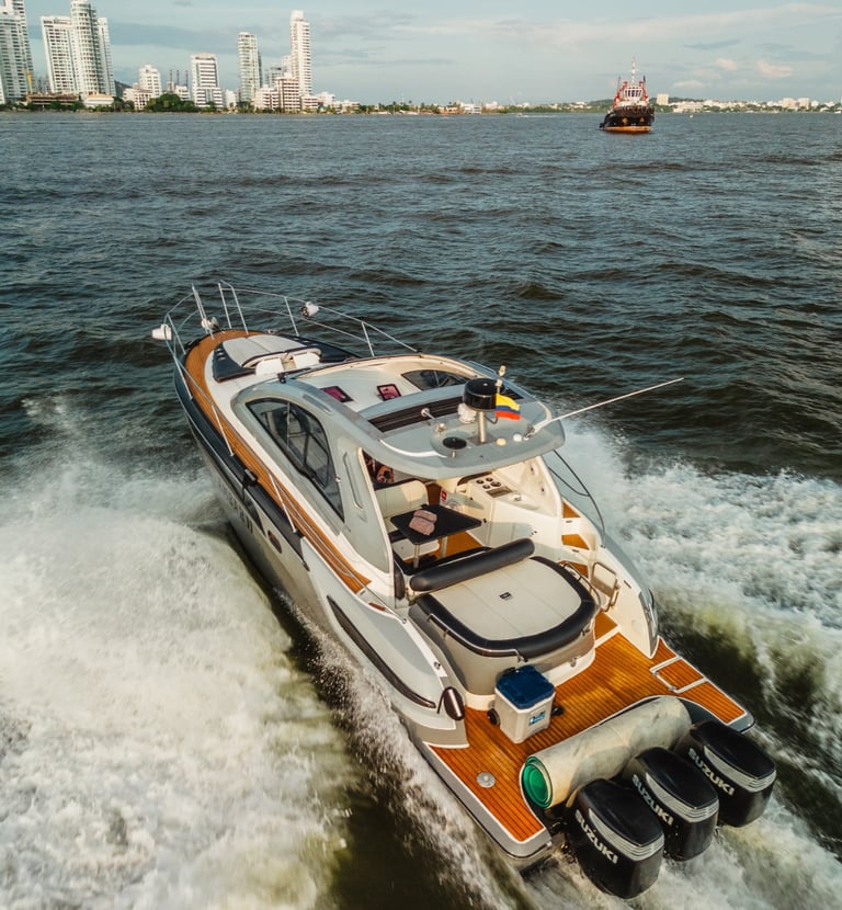 a boat with a motorbike on the water