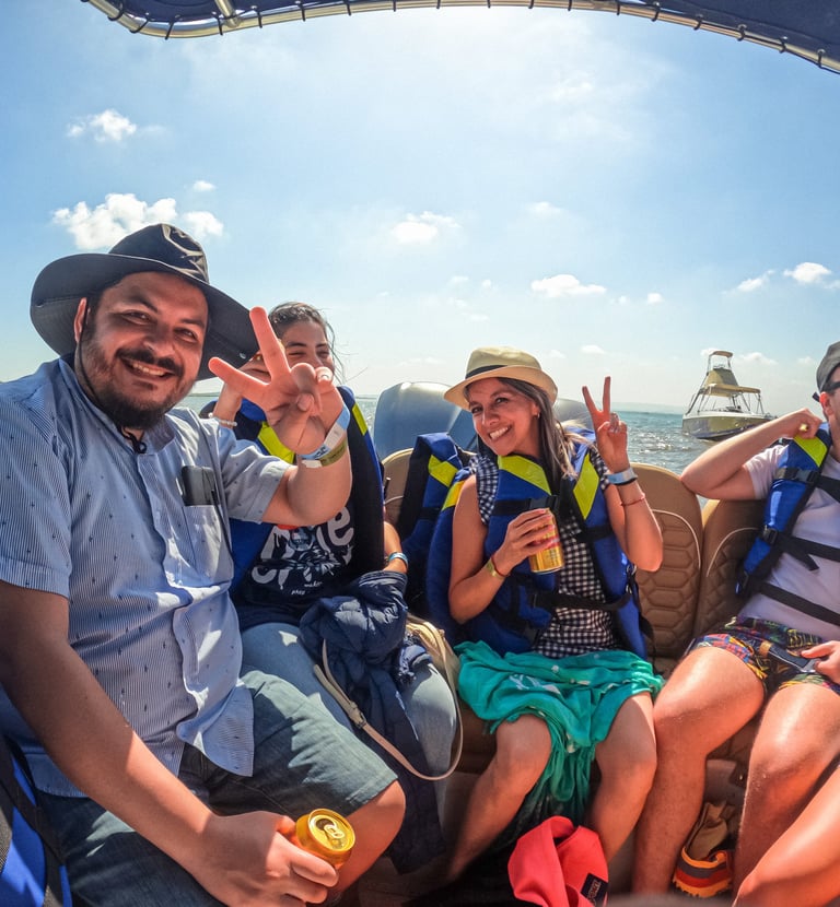 a group of people sitting on a boat