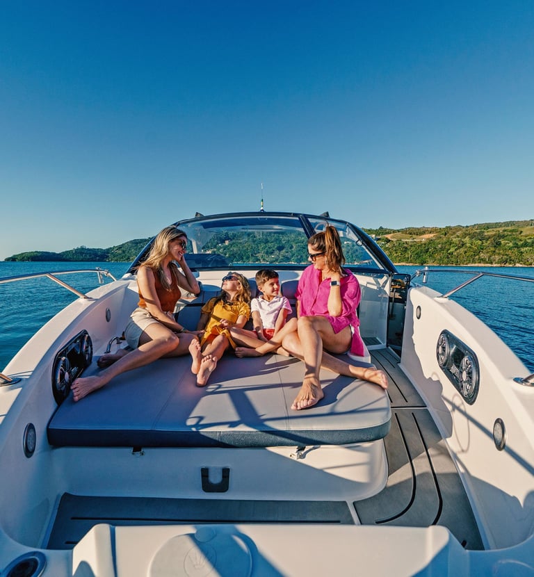 a family on a boat in the water