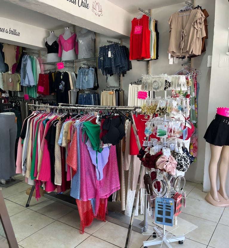 a clothing store with clothes and clothing on display