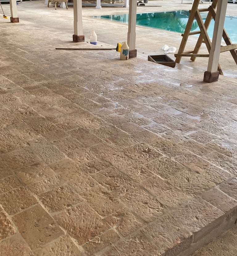Luxurious back porch cladded with Jamaican cut stone.