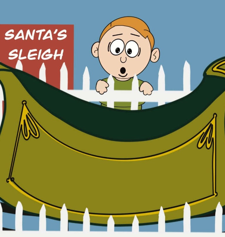 Boy looking at Santa Claus sleigh in the mall
