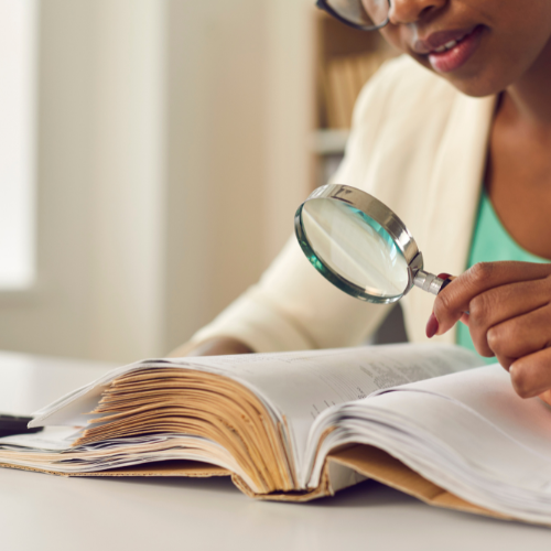 Legally blind child using assistive technology, screen reader, video magnifier for vision impairment