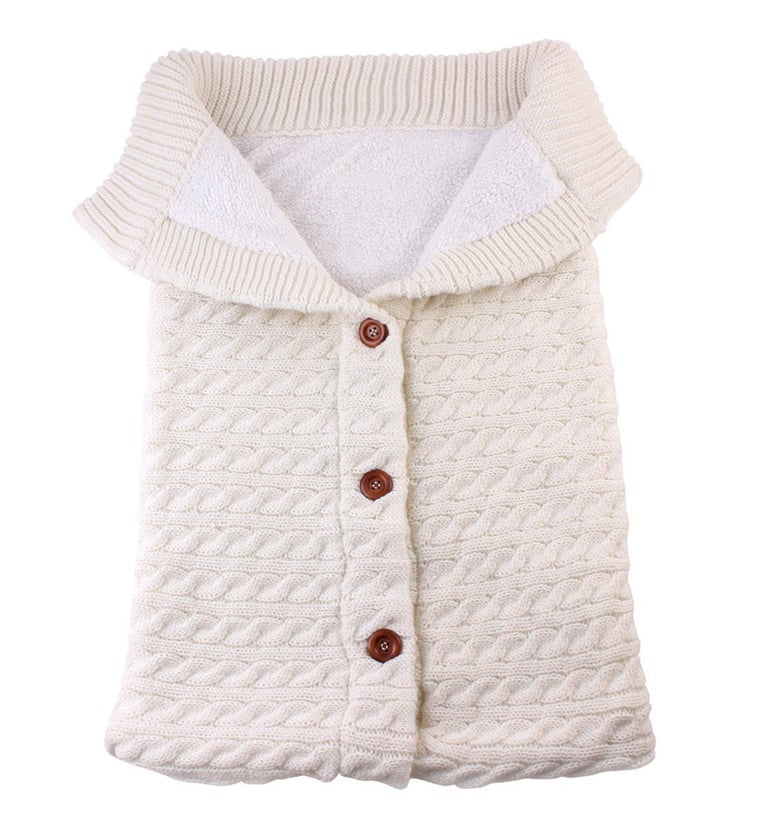 Baby sleeping bag with knitted fabric shell and fleece lining