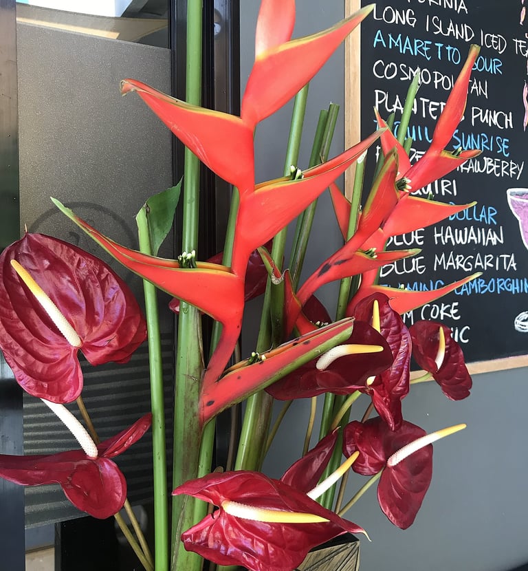 a vase with a flower arrangement in a vase