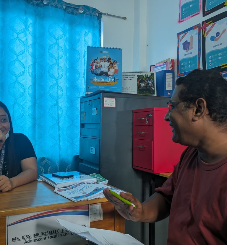 "A consultant in a lighter mood during the KII interview with a department of health official"