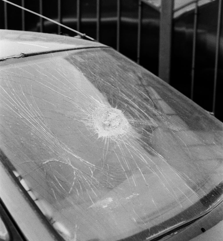 Auto glass worker performing windshield repair in Spring Hill TN
