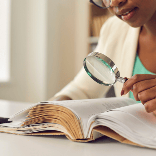 Legally blind child using assistive technology, screen reader, video magnifier for vision impairment