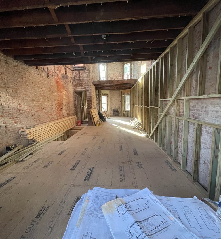 a room with a lot of floor plans and a lot of flooring