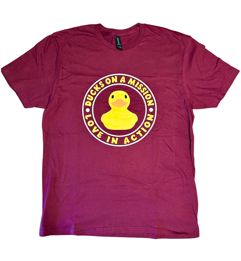 a red t - shirt with a duck on it