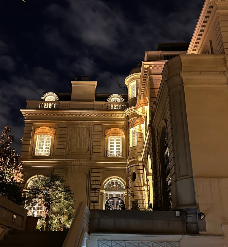 a building with stairs and a clock tower