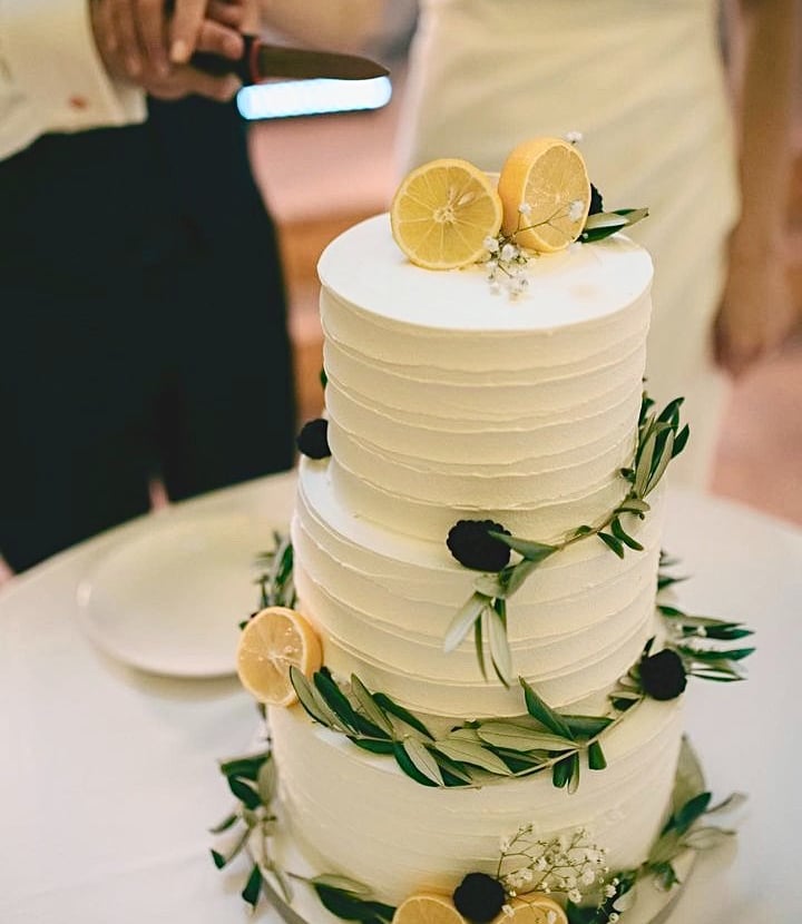 a wedding cake with lemonade and lemon slices