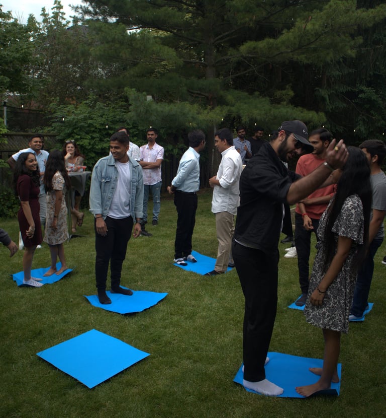 a group of people dancing in party of maple events
