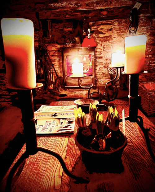 A table with candles and candles on it
