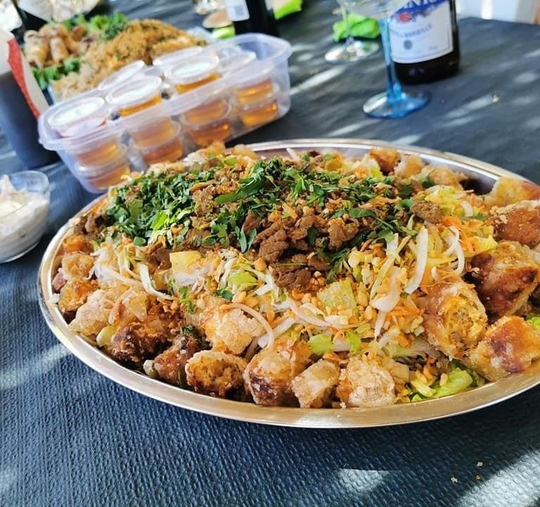 a plate of food with a bowl of food