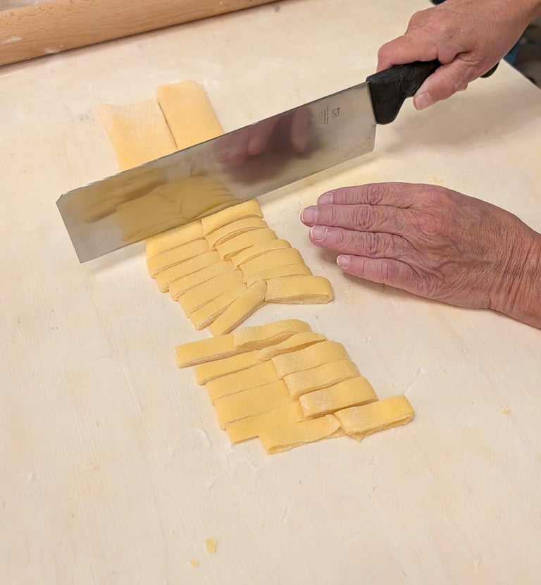 Pasta making at a home cooking experience in Torino