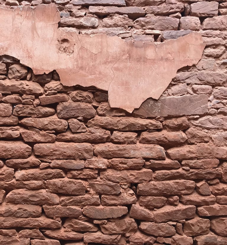 stone wall with a trace of the old earth coating, taken in Télouet (High Atlas)
