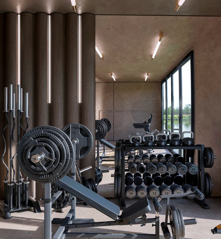 a gym room with a bunch of dumbs and dumbs