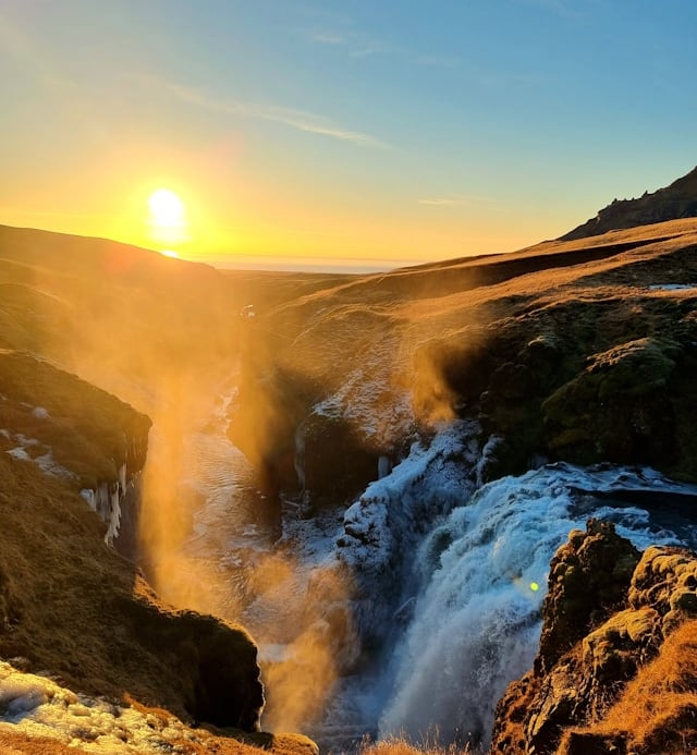 waterfall with sunset