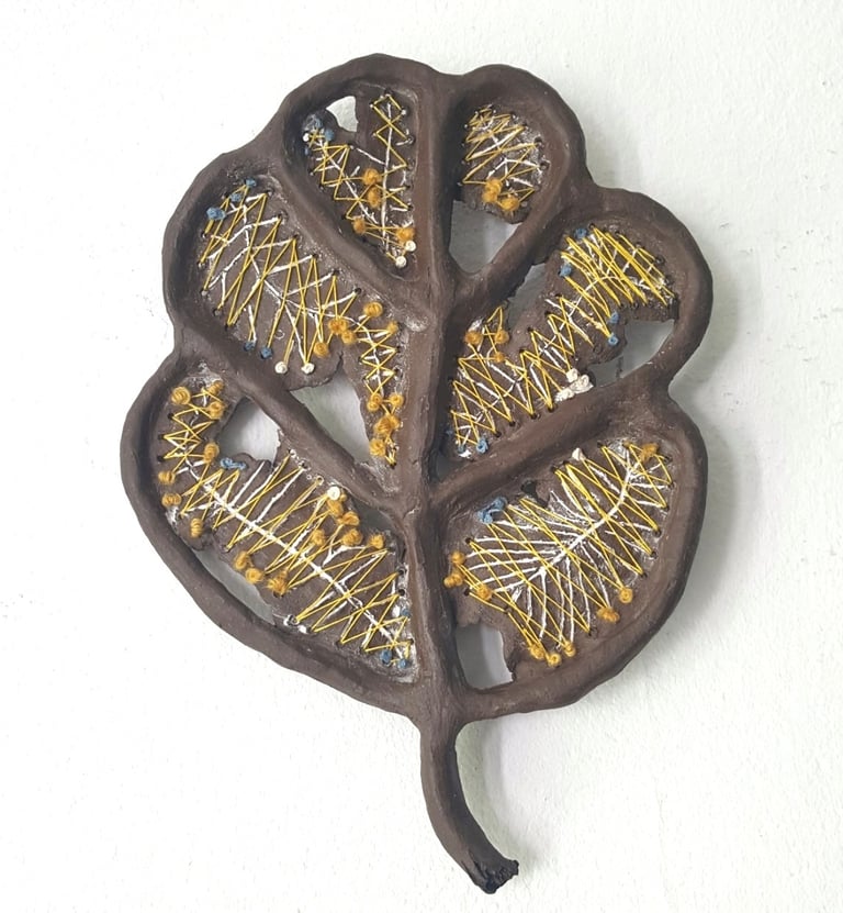reivented leaf with embroidery