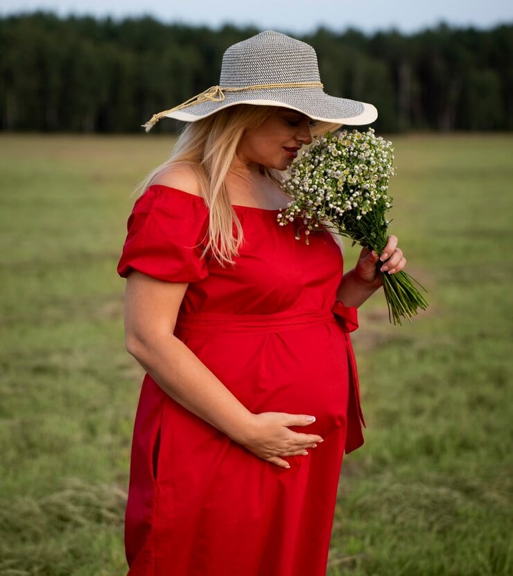 pregnant woman wearing red skin tone smoothing 