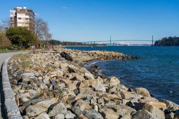 coastal seawall with bridge in horizon