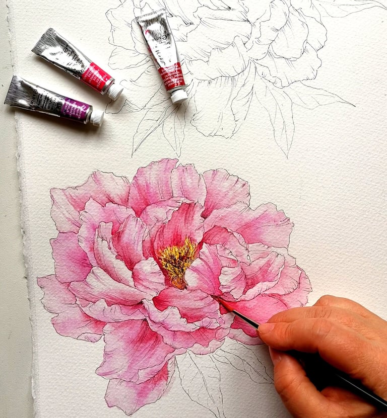 persona che dipinge un fiore ad acquerello