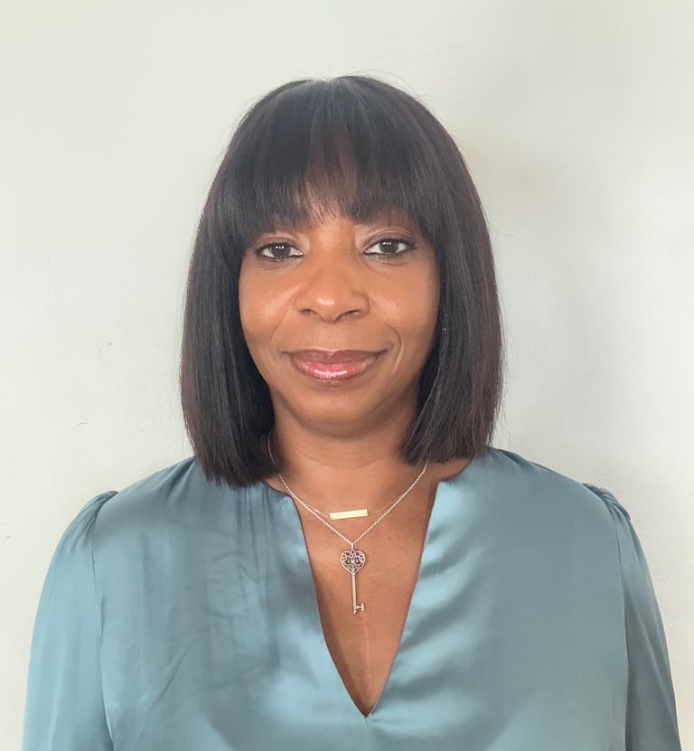 A headshot of the owner of Step by Step Support, Marie Smith.