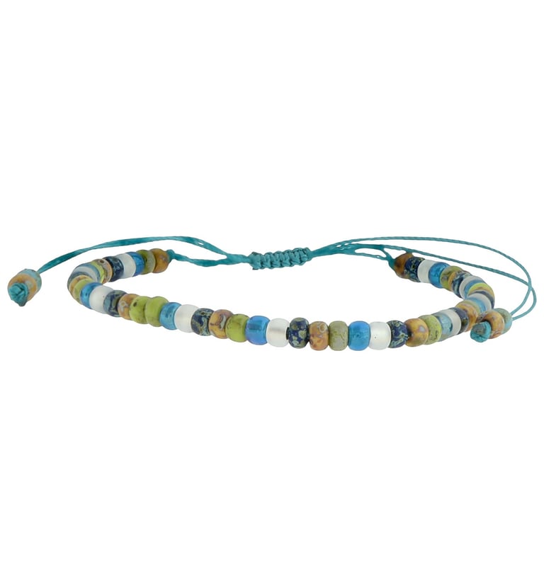 a beaded bracelet on turquoise string