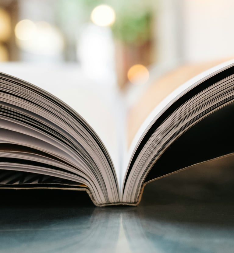a book opened to show a book with a bookmark
