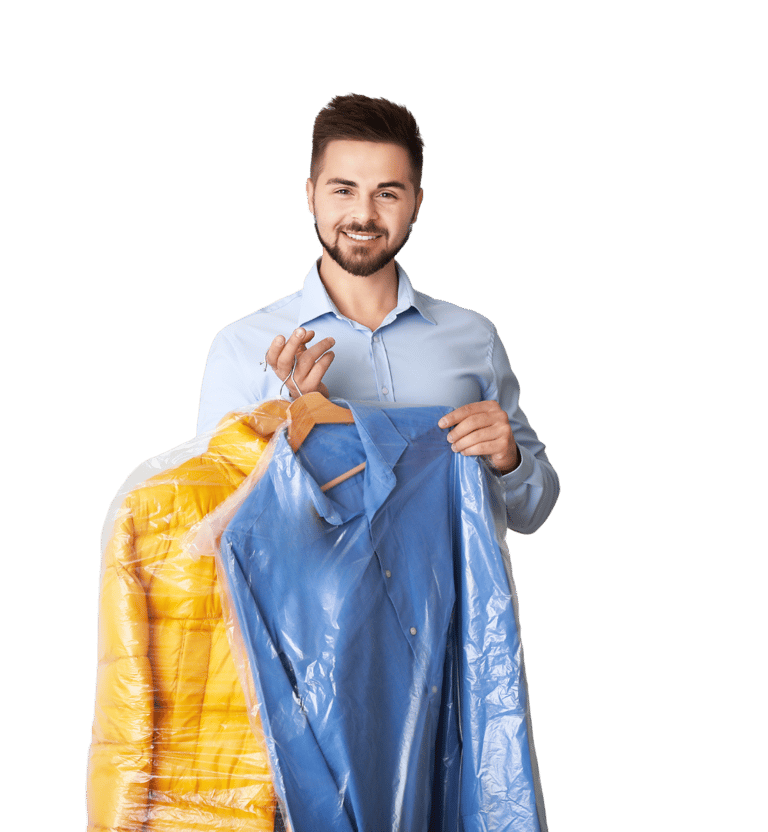 A man holding dry cleaning order on hangers