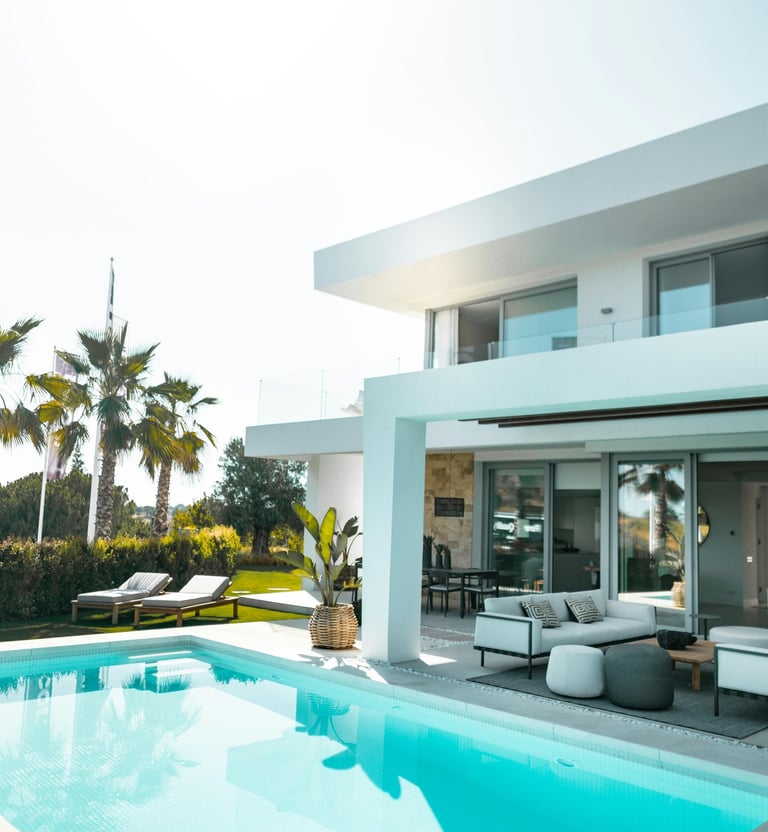 a large pool with a couch and a couch