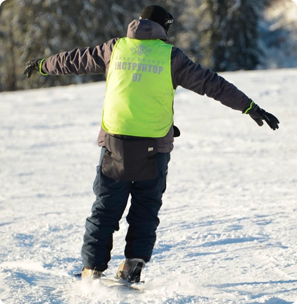 instructor snowboarding
