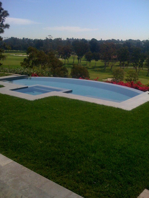 vanishing edge swimming pool overlooking golf course