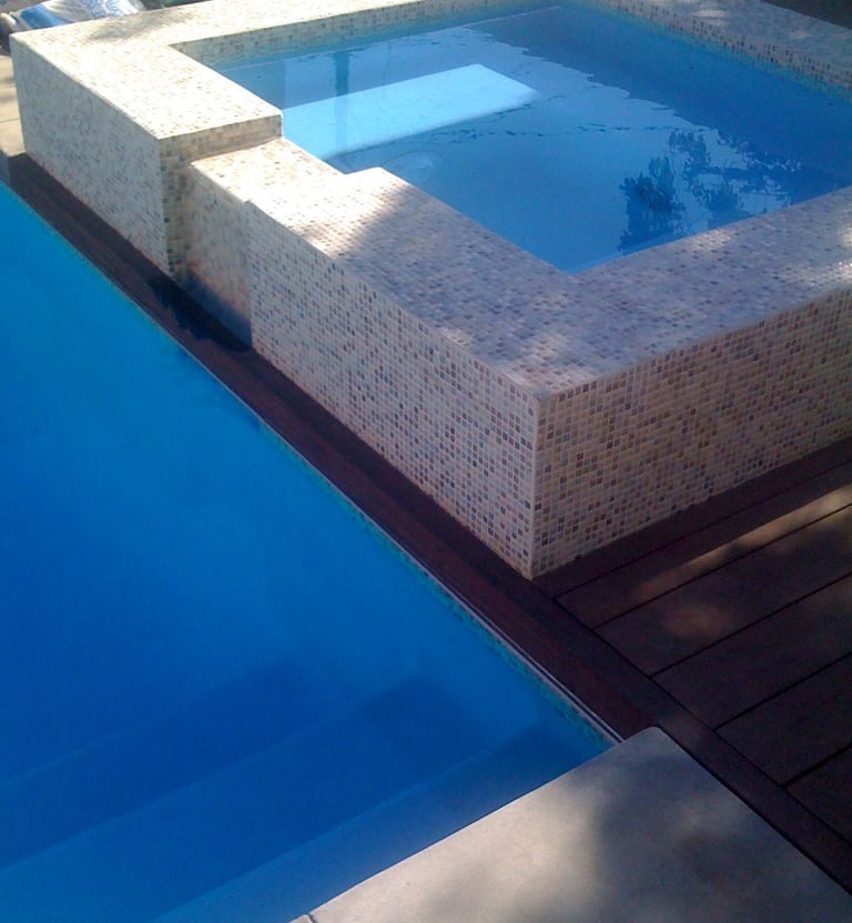 tiled spa with Brazilian hardwood decking