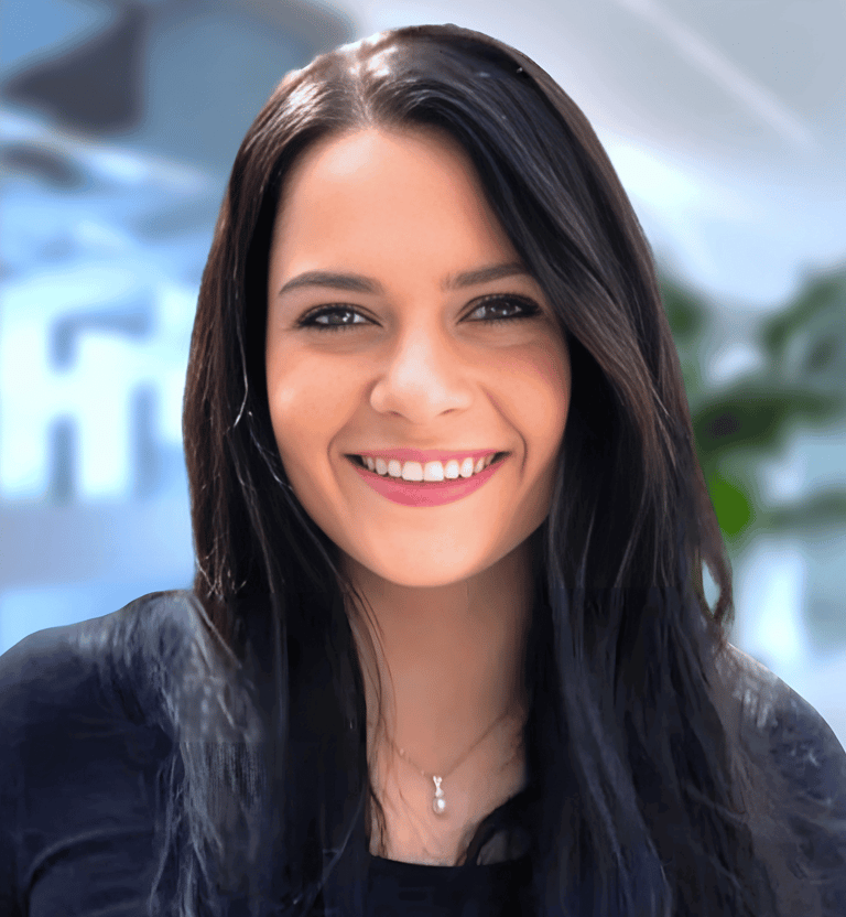 a woman with long hair and a black top