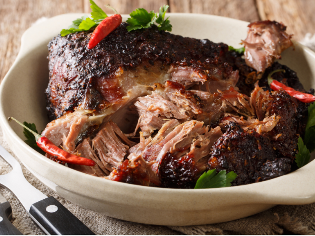 a plate of roasted pork, puerto rican pernil