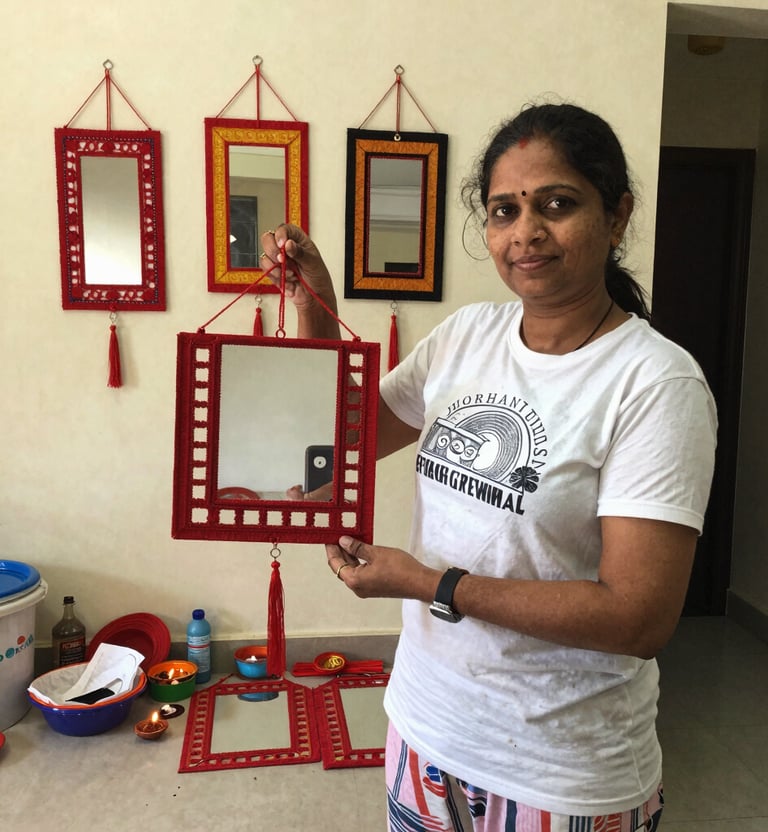 A group of women gathered outdoors, sharing stories and laughter while crafting vibrant textiles.