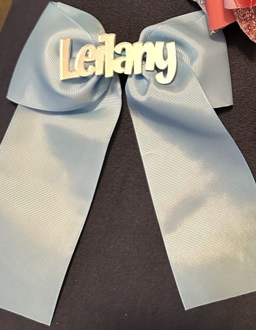 Moño de grosgrán azul claro personalizado con el nombre