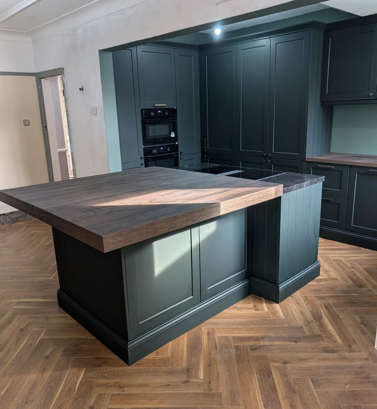 dark green with wooden tabletop kitchen