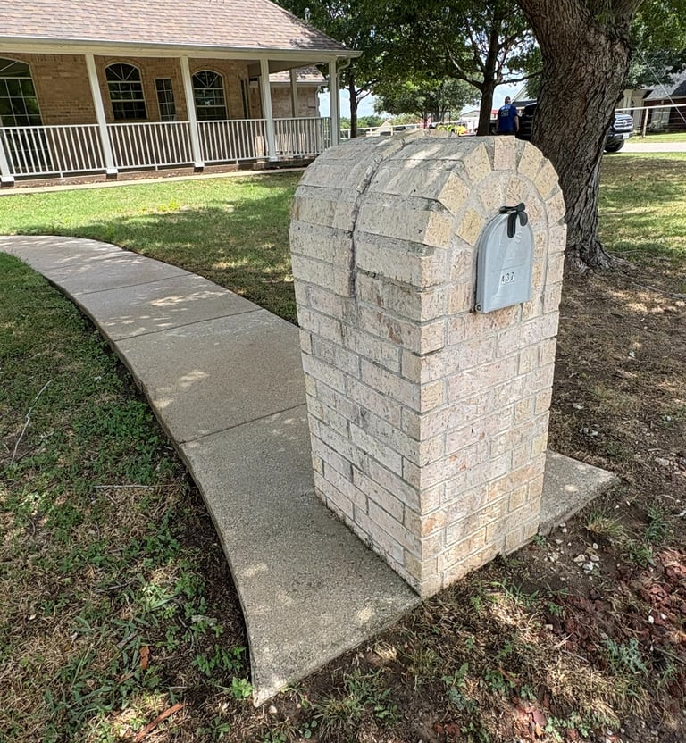 Mail Box and Side walk cleaned and bright.  Krum Texas