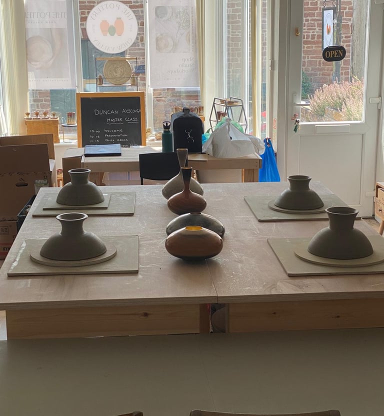A selection of pots made on a a sectional wheel throwing course in Bristol
