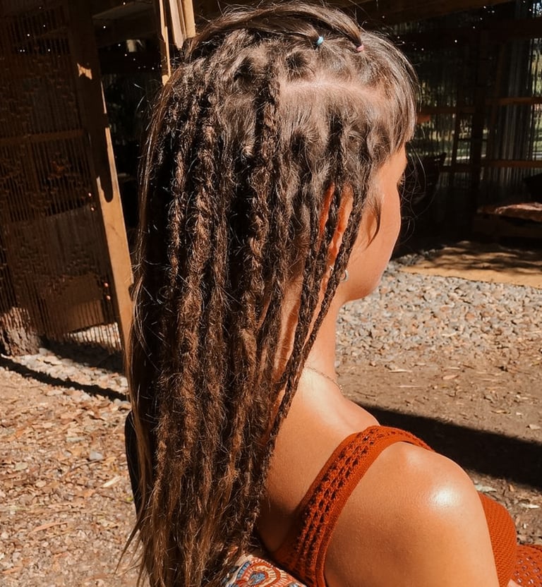 a woman with dreadlocks