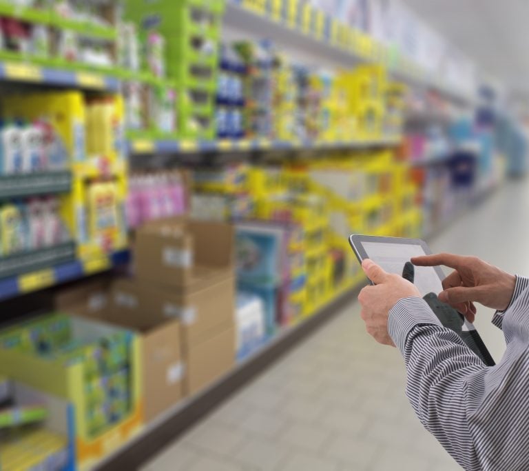 rep using a tablet and doing a retail audit in NJ