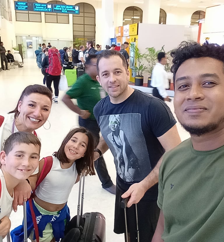 Family meeting their professional driver at Colombo Airport for a Sri Lanka tour.