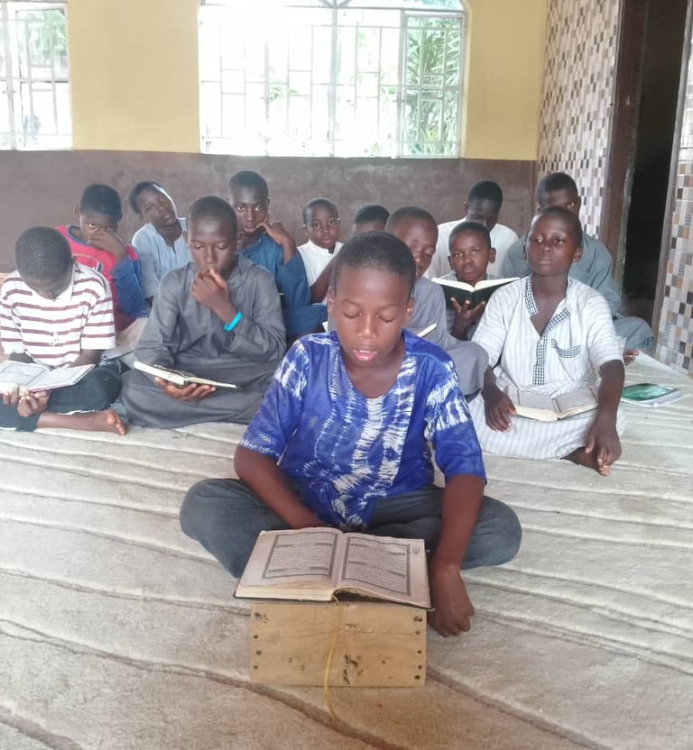 Young Muslim students reciting Quran in Maakitheena Foundation classroom