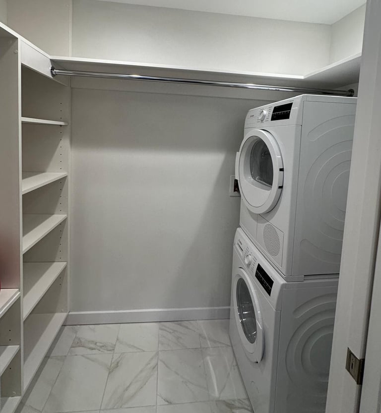 a laundry room with a washer and dryer