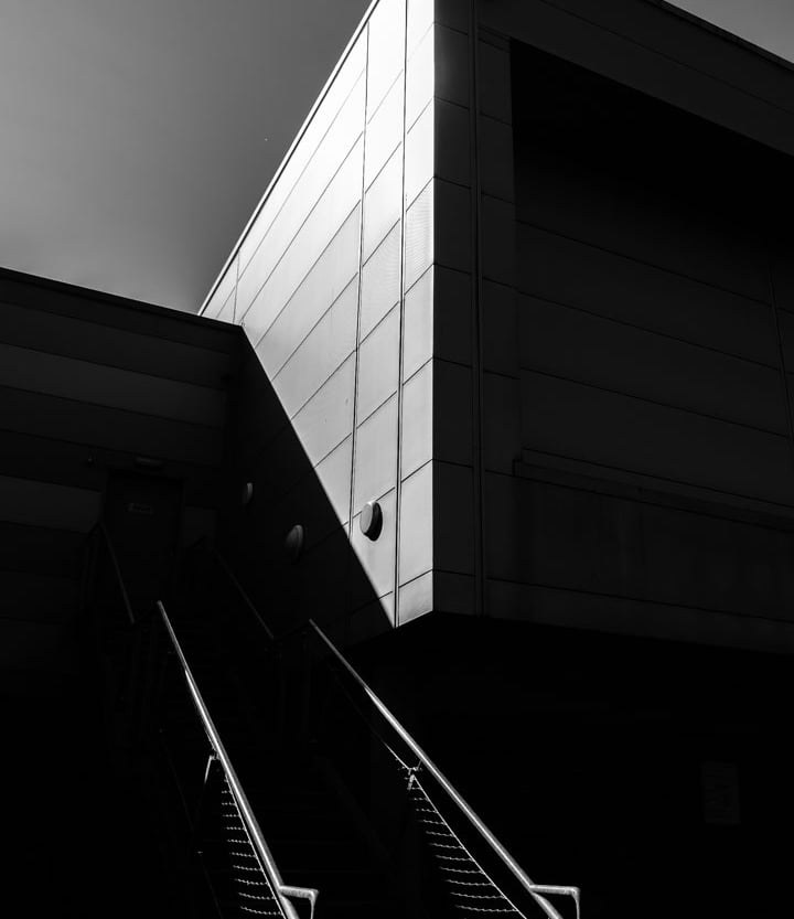 High contrast photo of modern building in shadow and bright light at Nottingham University