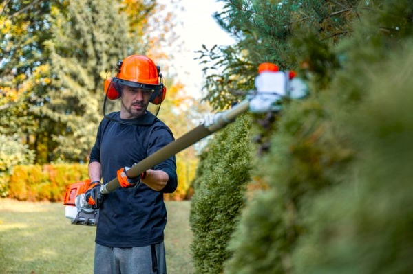 Landscape employee performing work