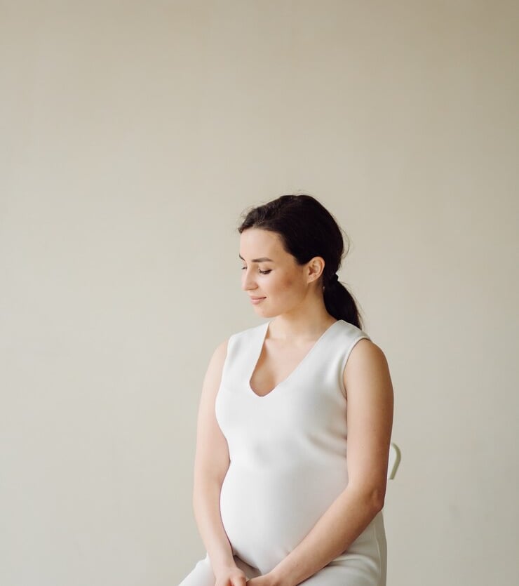 pregnant woman wearing white face beauty retouching 